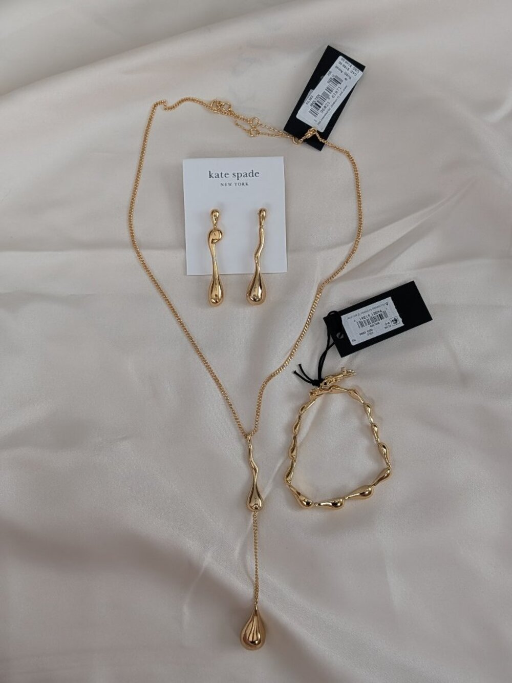 kate spade molten lariat necklace, linear earrings, and bracelet bundle
